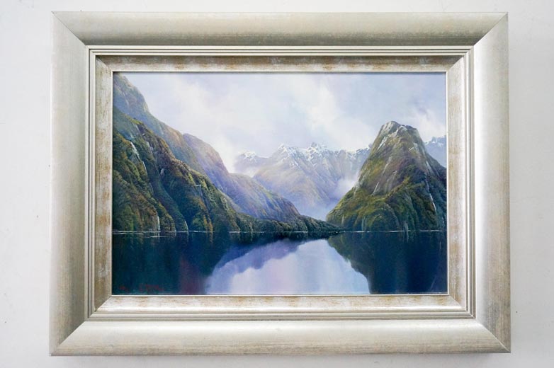 framed landscape painting